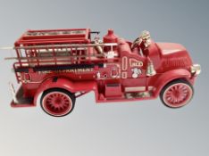 A Jim Beam Kentucky straight bourbon whiskey decanter in the form of a fire truck, 750cl,