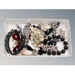 Small tray of assorted costume jewellery including dog brooches, 50's plastic earrings,