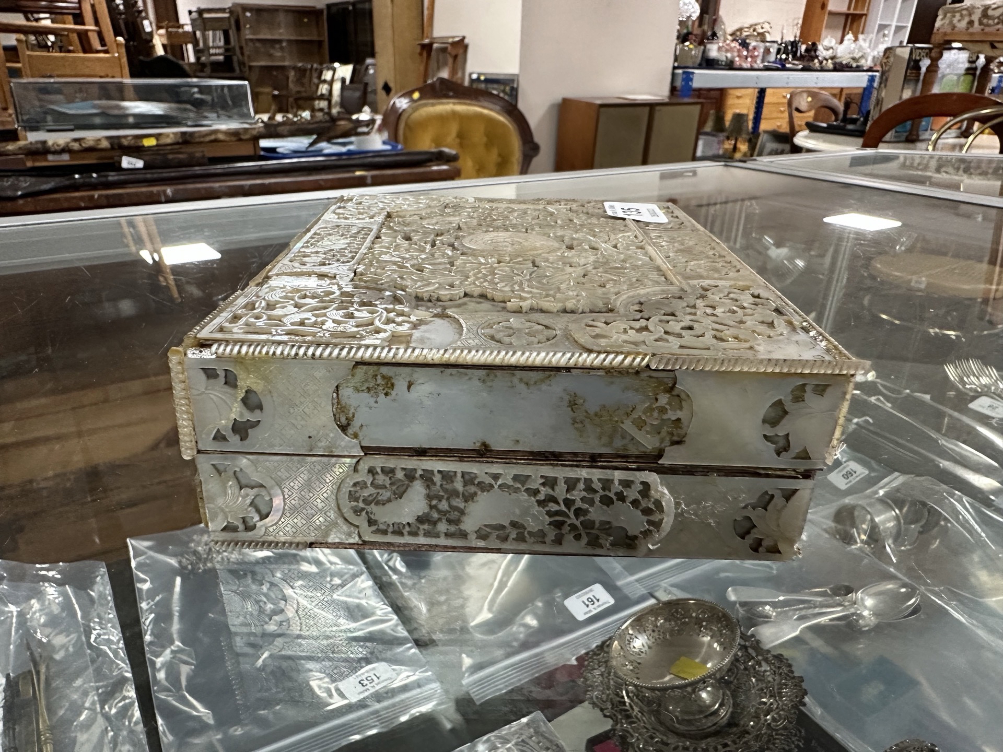 A 19th century Chinese export heavily carved mother of pearl gaming box, - Image 6 of 13