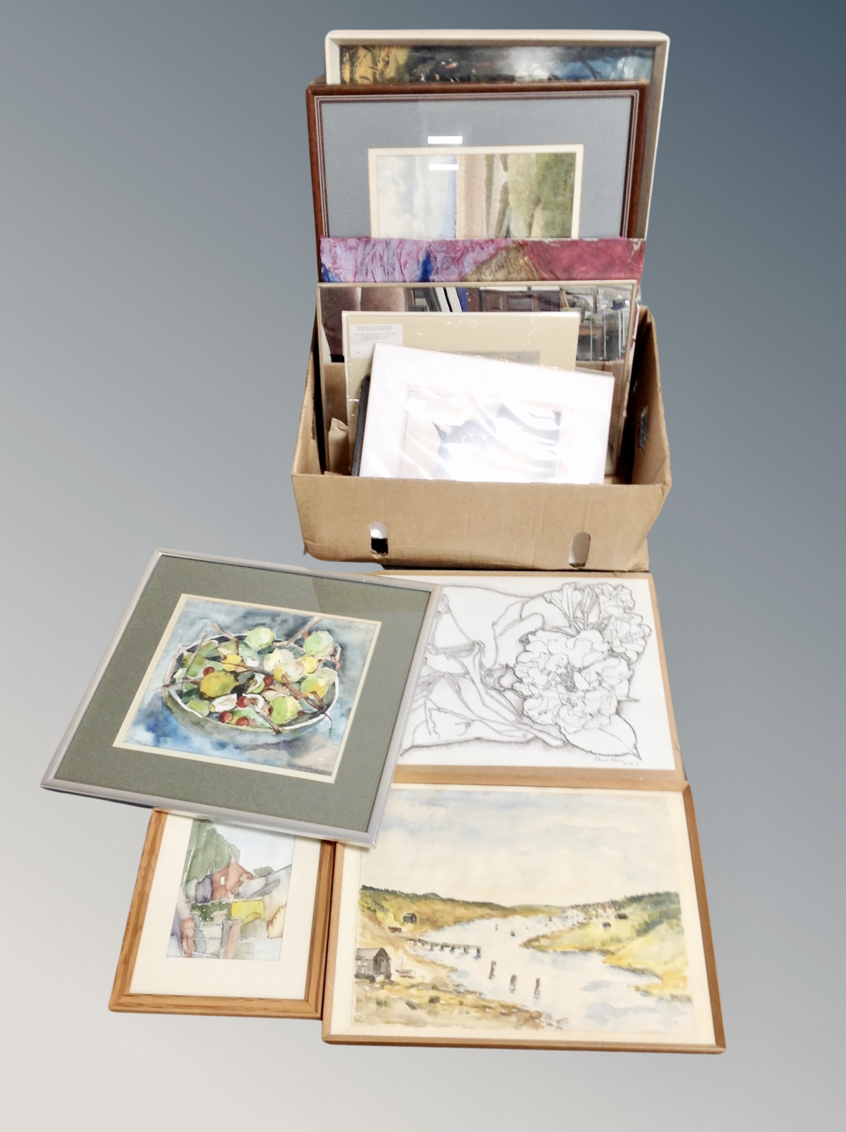 A box of pictures and prints, hand coloured engravings depicting Newcastle, watercolour drawings.