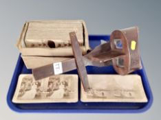 A stereoscope and a box of slides