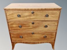 An Edwardian inlaid mahogany chest of three drawers,