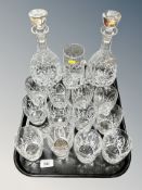 A tray of crystal decanters,