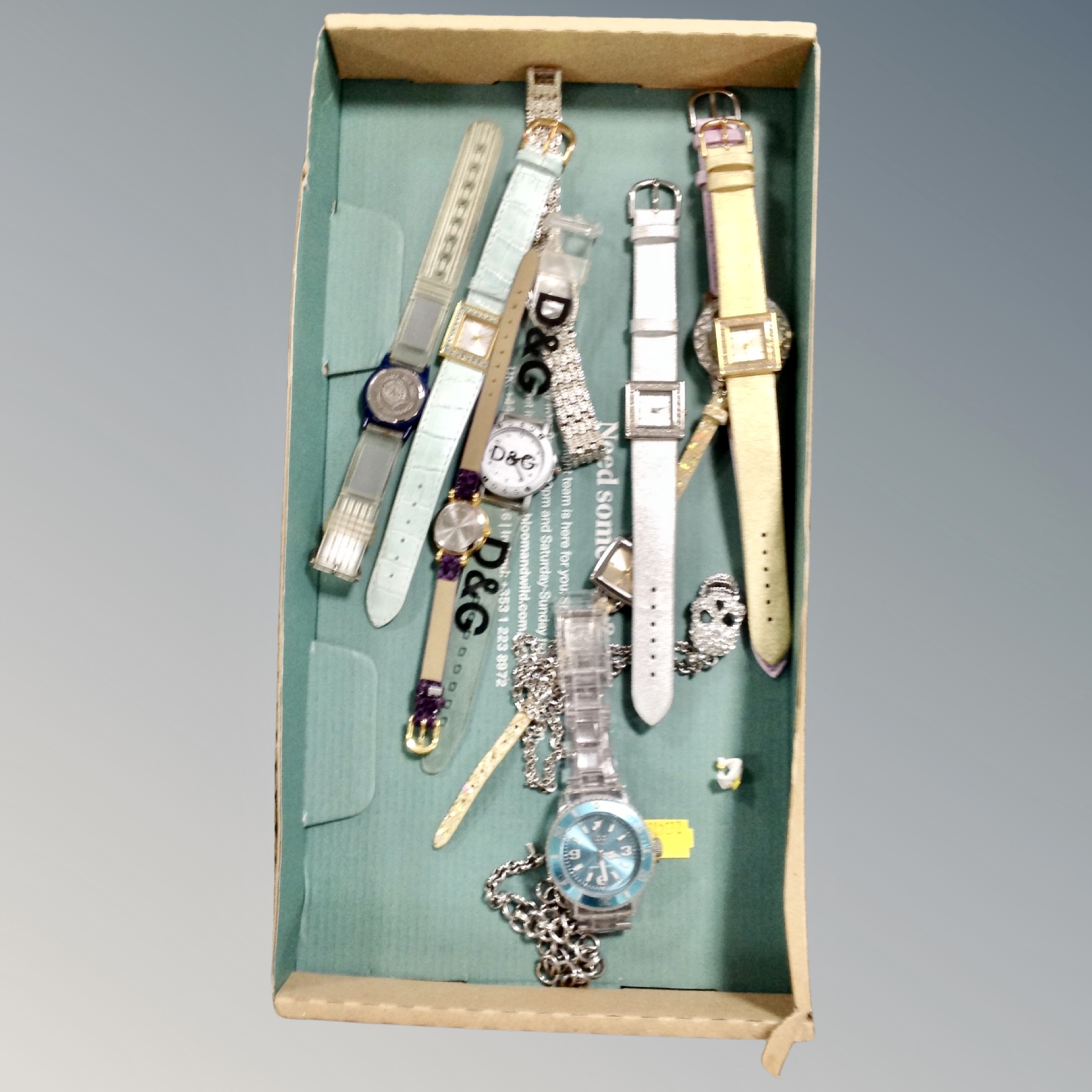 A quantity of mixed fashion watches and costume jewellery