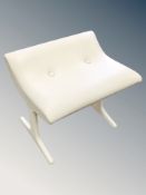 A 20th century white vinyl dressing table stool