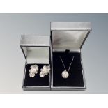 A boxed pair of Italian 925 leaf earrings,