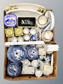 Two boxes of blue and white willow pattern china, Ringtons tins, Lurpack dish,