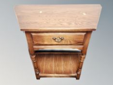 A contemporary oak side table fitted a drawer,