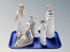A Group of five Lladro and Nao figures including girls and boys in night dress,