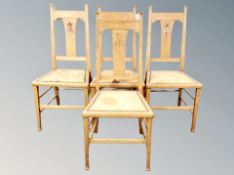 A set of four late Victorian oak single chairs
