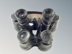 A pair of early 20th century binoculars 6 x 30 together with a further pair of field glasses