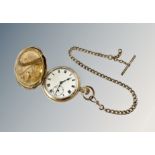A gold plated open face pocket watch on gilt Albert chain