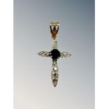 A 9ct yellow gold crucifix set with synthetic sapphire 1.9g., length 3 cm including bale.