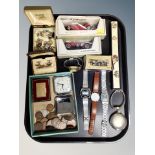 A tray of die cast models, wrist watches,