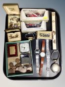 A tray of die cast models, wrist watches,