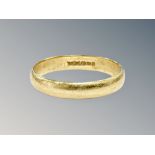 An 18ct gold band ring, size L CONDITION REPORT: 2.