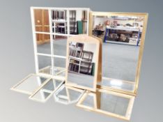 A late 20th century sectional mirror together with six further mirrors