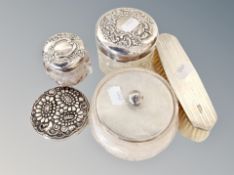A silver backed dressing table brush, silver topped dressing table pot,