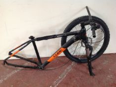 A Cube front suspension bike frame with front wheel