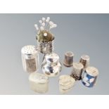 A collection of silver and white metal items : thimbles, pin stand, pepper pot,