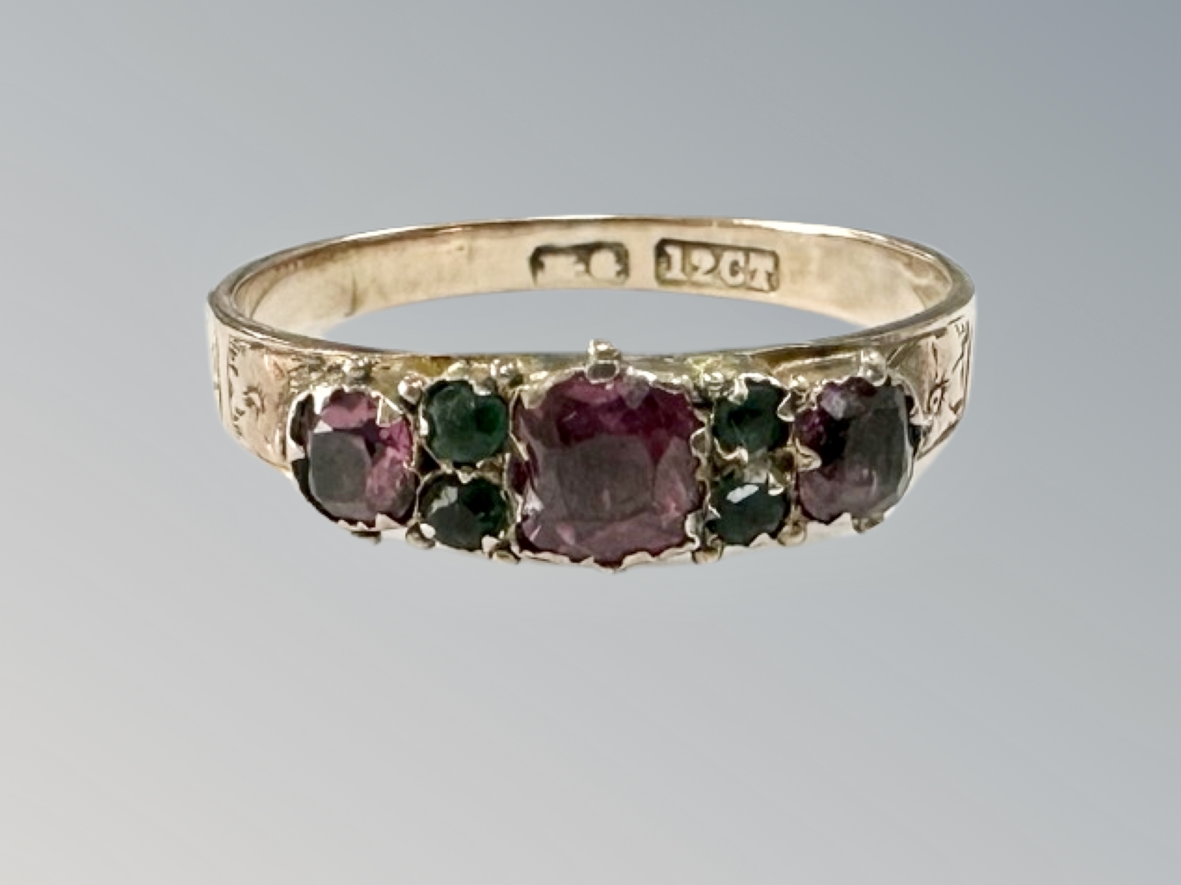 A Victorian ruby and emerald ring stamped 12ct, size O CONDITION REPORT: 1.