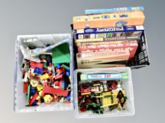 Two crates of Lego and Philiform construction sets together with further box of board games,