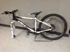A Calibre Two Two front suspension mountain bike (no front wheel)