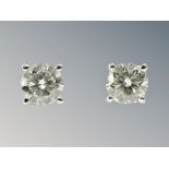 A pair of 18ct white gold diamonds stud earrings, each approximately 0.3ct.