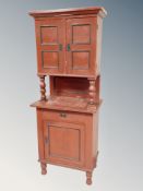 An early 20th century Continental pine double door buffet cabinet fitted with a drawer and cupboard