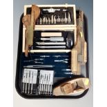 A tray of precision instruments : screw driver set, draughtsman's case,