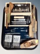 A tray of precision instruments : screw driver set, draughtsman's case,