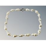 A Sterling silver mounted baroque pearl necklace, length 40 cm.