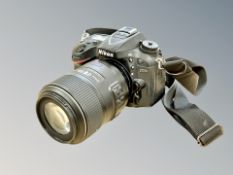 A Nikon D7200 camera with AF-S Micro Nikkor 105mm 1:2.
