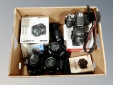 A box of cameras to include Canon EOS 500, Canon EOS 700D,
