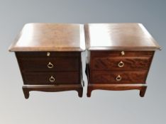 A pair of Stag Minstrel two drawer bedside chests