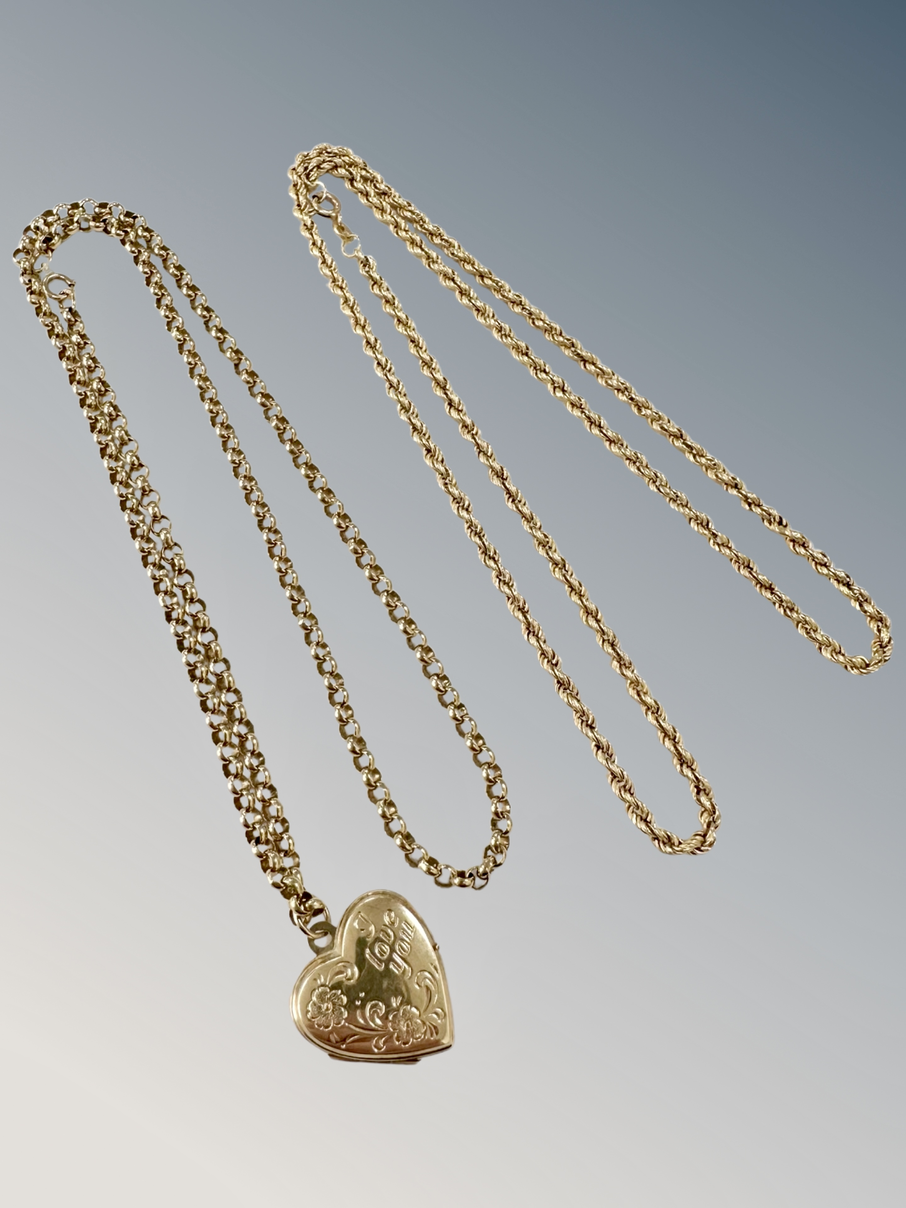 Two 9ct gold necklaces, one with heart locket CONDITION REPORT: 14.