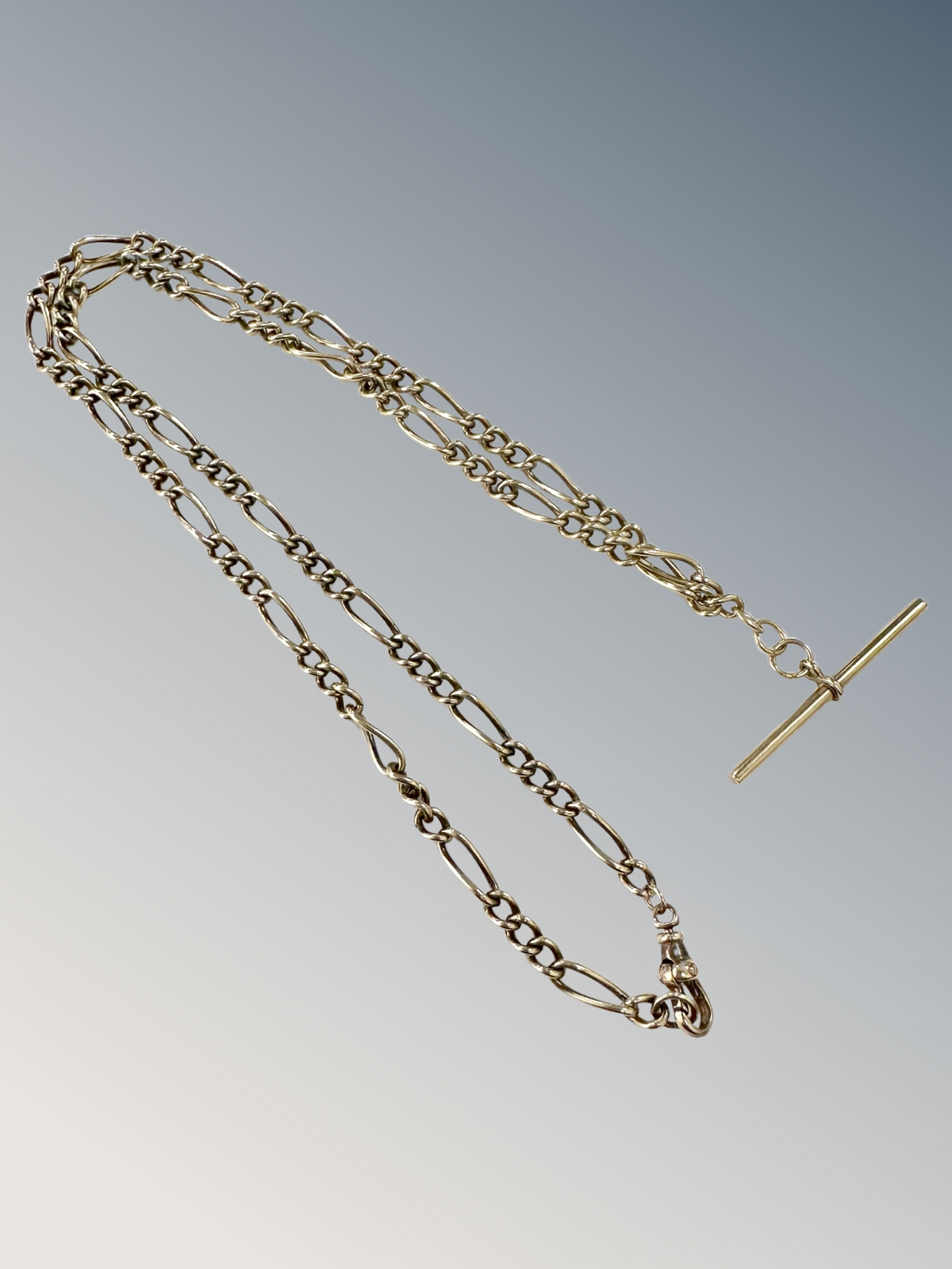 A 9ct gold watch chain with T-bar CONDITION REPORT: 7g