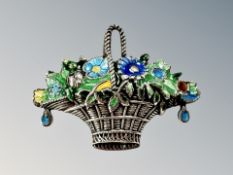 A vintage silver and enamel brooch