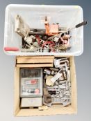 A crate and box containing bench vice, G-clamps.