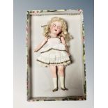 An early 20th century Armand Marseille bisque headed doll