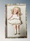 An early 20th century Armand Marseille bisque headed doll