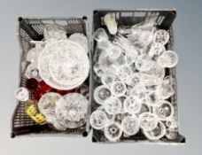 Two crates of assorted glass,