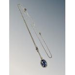 A platinum sapphire and diamond cluster pendant suspended on white metal chain CONDITION