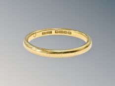 A 22ct gold band ring, size P½ CONDITION REPORT: 3.