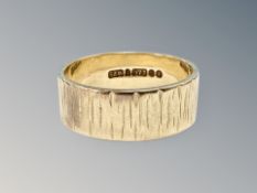 A 9ct gold band ring, size M CONDITION REPORT: 4.