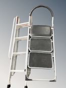 A triple section loft ladder and a set of folding steps