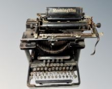 An antique Remington typewriter with cover
