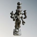 A 19th century Indian bronze devotional deity figure, height 14.