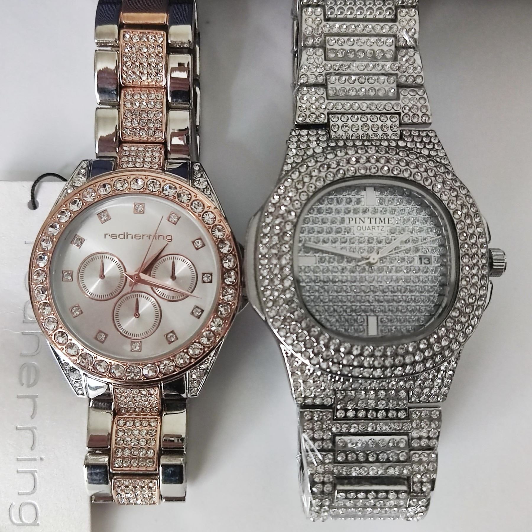 A lady's Red Herring encrusted watch and a further diamante watch (Af)