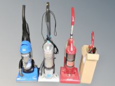 A Hoover 1900W upright vacuum together with a Vax vacuum,